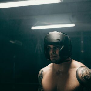 Topless Man Wearing Black Helmet